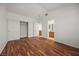 Bedroom with wood floors, closet, and door to the bath at 5148 Forest Oaks Dr, Las Vegas, NV 89149