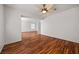 Bright living room with wood floors and ceiling fan at 5148 Forest Oaks Dr, Las Vegas, NV 89149