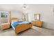 Cozy bedroom features a comfortable bed with matching nightstands and dressers, providing a relaxing retreat at 5224 Dana Springs Way, Las Vegas, NV 89130