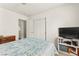 This lovely bedroom features carpet, closet, and a TV on a shelf at 5224 Dana Springs Way, Las Vegas, NV 89130