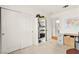 Bright bedroom boasts closet, white shelving, desk, and US map at 5224 Dana Springs Way, Las Vegas, NV 89130