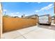Long driveway providing ample parking space, complemented by a secure wall for added privacy at 5224 Dana Springs Way, Las Vegas, NV 89130