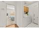 Functional laundry room features modern washer and dryer and extra storage at 5224 Dana Springs Way, Las Vegas, NV 89130
