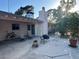 Inviting outdoor patio area, perfect for relaxing or entertaining guests with chairs and room for activities at 5352 Eugene Ave, Las Vegas, NV 89108