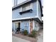 Charming two-story exterior with blue siding, brick accents and a well-maintained front yard at 5365 Shake Ct # 103, Las Vegas, NV 89122