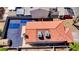 Aerial view showing the house, backyard, and roof with terracotta tiles and air conditioning units at 5853 Calobar Ln, Las Vegas, NV 89110
