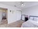 Bedroom featuring carpeted floors, a ceiling fan, and a closet for storage at 5853 Calobar Ln, Las Vegas, NV 89110
