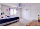 Bedroom featuring carpeted floors and a window with curtains at 5853 Calobar Ln, Las Vegas, NV 89110