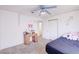 Bedroom featuring carpeted floors and a desk at 5853 Calobar Ln, Las Vegas, NV 89110