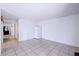 Spacious living room featuring neutral paint, tile floors and recessed lighting at 5853 Calobar Ln, Las Vegas, NV 89110