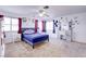 Bedroom featuring carpet, natural light, and a ceiling fan at 5853 Calobar Ln, Las Vegas, NV 89110