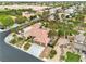 An aerial view showcases a single-story home with desert landscaping and a two car garage at 5889 Taylor Valley Ave, Las Vegas, NV 89131