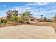 Spacious backyard with ample room for outdoor activities, complemented by desert landscaping at 5889 Taylor Valley Ave, Las Vegas, NV 89131
