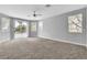 Spacious bedroom with multiple windows and sliding door at 5889 Taylor Valley Ave, Las Vegas, NV 89131