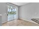 Dining area featuring tile floors and sliding glass doors to the backyard at 5889 Taylor Valley Ave, Las Vegas, NV 89131
