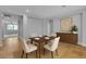 Dining room featuring neutral colors, wood table, and simple decor at 5889 Taylor Valley Ave, Las Vegas, NV 89131