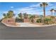 Charming single-story home featuring mature landscaping, a gated driveway, and a well-manicured front yard at 5889 Taylor Valley Ave, Las Vegas, NV 89131