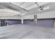 Spacious garage with ample storage and lighting at 5889 Taylor Valley Ave, Las Vegas, NV 89131