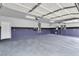 Clean, spacious garage with epoxy floors, room for multiple vehicles, and plenty of storage space at 5889 Taylor Valley Ave, Las Vegas, NV 89131