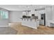 Bright, open concept living and dining area that leads into a modern kitchen at 5889 Taylor Valley Ave, Las Vegas, NV 89131