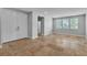 Sun-drenched living room showcases tile flooring, neutral decor, recessed lighting and ample natural light at 5889 Taylor Valley Ave, Las Vegas, NV 89131