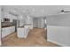 Open living room featuring tile floors, and granite breakfast bar at 5889 Taylor Valley Ave, Las Vegas, NV 89131