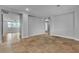 Large open concept living room with natural light and tile floors at 5889 Taylor Valley Ave, Las Vegas, NV 89131