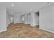 Bright open-concept living room featuring tile flooring and recessed lighting at 5889 Taylor Valley Ave, Las Vegas, NV 89131