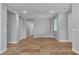 Large open concept living room with natural light and tile floors at 5889 Taylor Valley Ave, Las Vegas, NV 89131