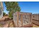 Backyard landscaped with plants and a chicken coop at 621 Mount Elbert Way, Boulder City, NV 89005