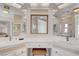 Bright bathroom vanity with dual sinks, ample storage, and good lighting at 621 Mount Elbert Way, Boulder City, NV 89005