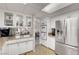 Clean, well-organized kitchen with modern appliances and glass-front cabinets at 621 Mount Elbert Way, Boulder City, NV 89005