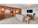 Spacious living room with bar, comfortable seating, and entertainment center at 621 Mount Elbert Way, Boulder City, NV 89005