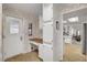 Mud room with exterior access, a built-in desk, and ample storage cabinets at 621 Mount Elbert Way, Boulder City, NV 89005