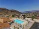 Inviting community pool area with mountain views and desert landscape at 621 Mount Elbert Way, Boulder City, NV 89005