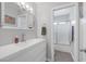 This bathroom includes a large mirror, modern vanity, and a shower-tub combo at 6308 Canyon Ridge Dr, Las Vegas, NV 89108