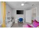 Comfortable room features desk, closet, ceiling fan, and is brightly lit by natural light at 6308 Canyon Ridge Dr, Las Vegas, NV 89108