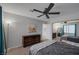This bedroom is spacious with a ceiling fan, natural light and adjacent closet space at 6308 Canyon Ridge Dr, Las Vegas, NV 89108