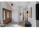 Home entryway featuring wood flooring, a decorative door, and neutral paint at 6308 Canyon Ridge Dr, Las Vegas, NV 89108