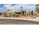 Attractive single-story house featuring desert landscaping, a brick border, and a warm, inviting facade at 6308 Canyon Ridge Dr, Las Vegas, NV 89108