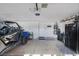 This garage features ample storage with an off-road vehicle parked inside at 6308 Canyon Ridge Dr, Las Vegas, NV 89108