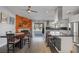 Bright, open kitchen flows to dining area with stainless appliances and modern island at 6308 Canyon Ridge Dr, Las Vegas, NV 89108