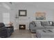 Cozy living room features a fireplace and comfortable seating, perfect for relaxing with friends or Gathering at 6308 Canyon Ridge Dr, Las Vegas, NV 89108