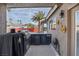 Gourmet outdoor kitchen featuring built-in grill, counter space, and convenient access to backyard amenities at 6308 Canyon Ridge Dr, Las Vegas, NV 89108