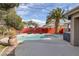 Inviting backyard pool featuring a spacious concrete deck, desert landscaping, and seating areas at 6308 Canyon Ridge Dr, Las Vegas, NV 89108