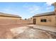 This property features a gravel backyard with patio and secure entry gate and windows at 6512 N Bruce St, North Las Vegas, NV 89086