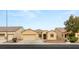 Inviting single-story home with a two-car garage and well-maintained front yard at 6512 N Bruce St, North Las Vegas, NV 89086