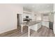 Well-appointed kitchen featuring a center island, stainless appliances, and modern finishes at 6512 N Bruce St, North Las Vegas, NV 89086