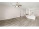 Spacious living room features hardwood floors and large ceilings with plenty of natural light at 6512 N Bruce St, North Las Vegas, NV 89086