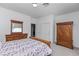 Bedroom featuring bed with patterned bedding and natural light at 6638 Dazzling Heights Ln, Las Vegas, NV 89110